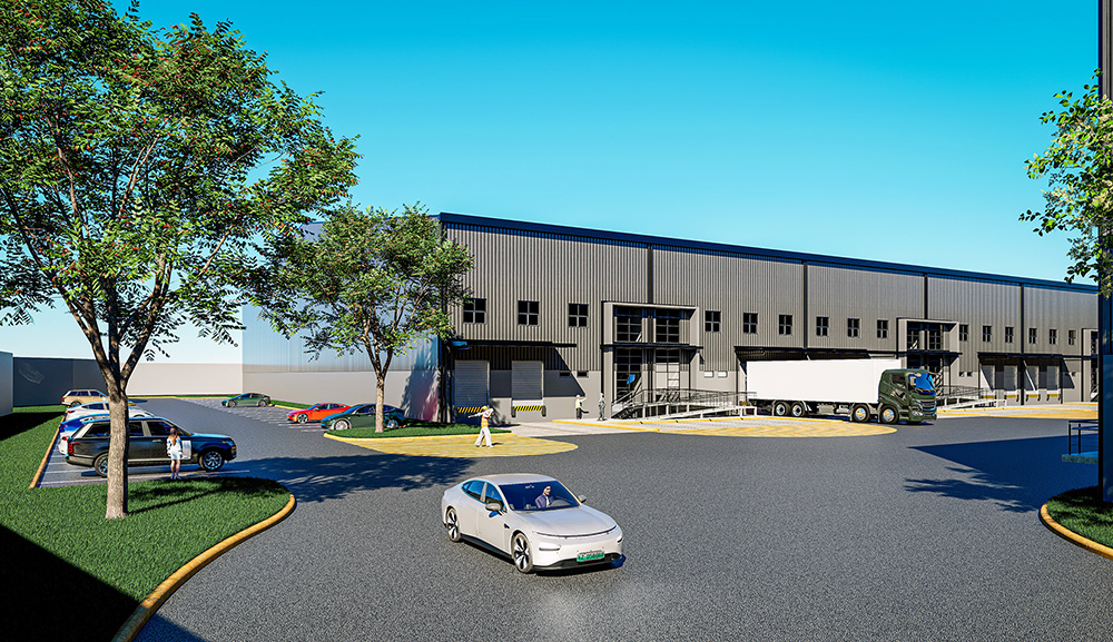 Street-level view of industrial warehouse with docks, ramp, main entrance, parking, and green areas