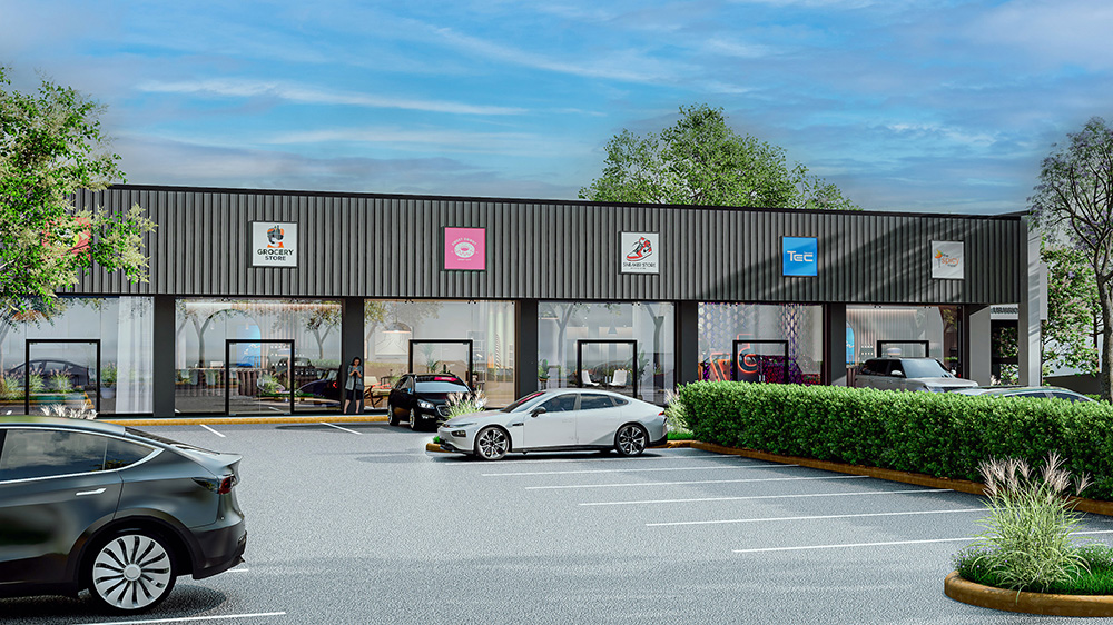 Front view of commercial spaces with modern glass façades and large front parking area